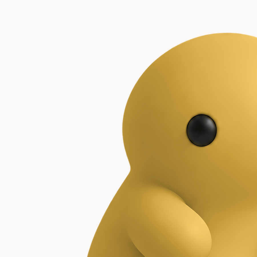 A Mustard Corbie, cropped close on one eye.